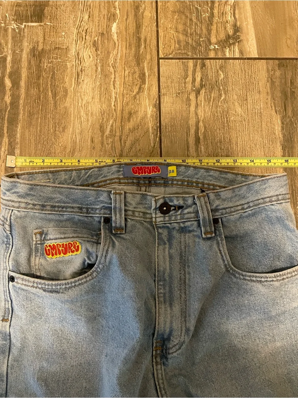 Light Wash Men's Jeans with Branded Pocket Patch